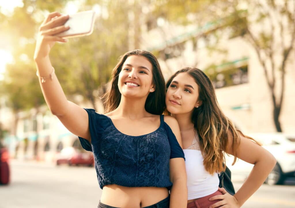 two gen z girls taking a selfie